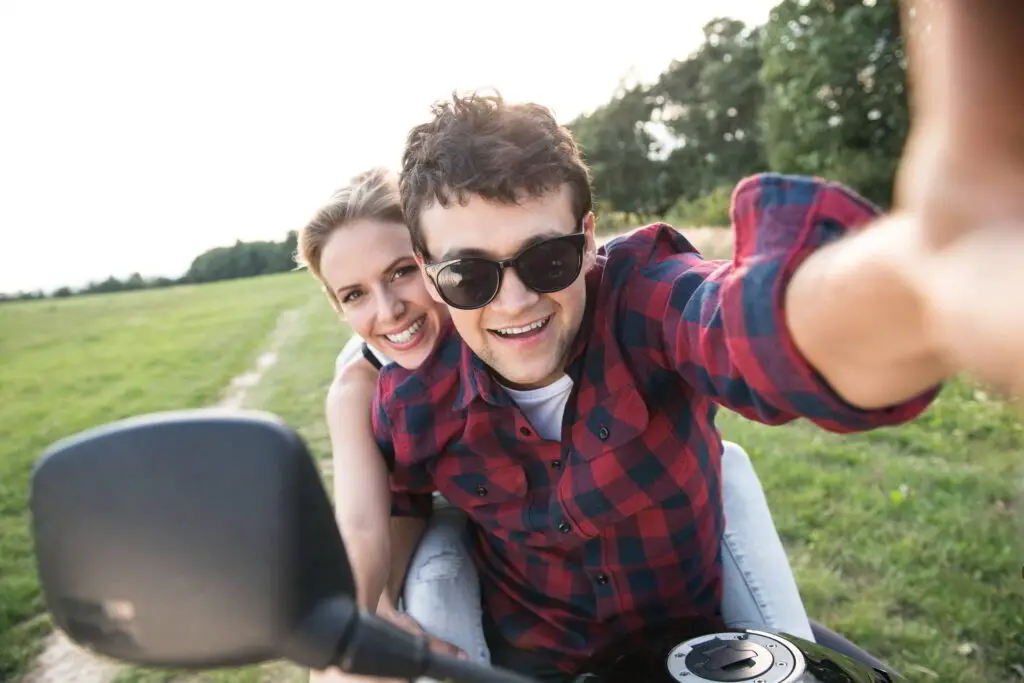 beautiful young couple love enjoying quad bike ride countryside couple driving